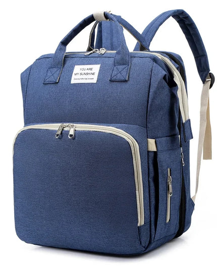 Blauer Handgepäck Rucksack für Damen mit Laptopfach und vielen Fächern, ideal für Reisen und Kurztrips.