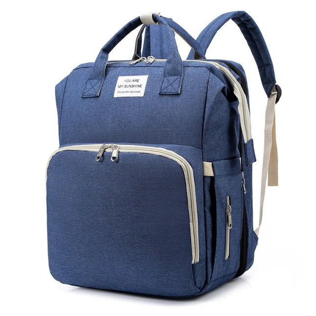 Blauer Handgepäck Rucksack für Damen mit Laptopfach und vielen Fächern, ideal für Reisen und Kurztrips.